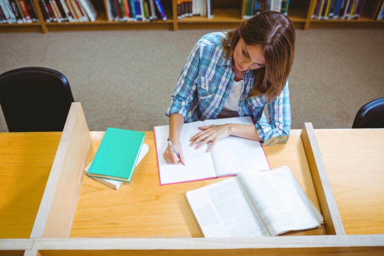 Mature student in the library at the university